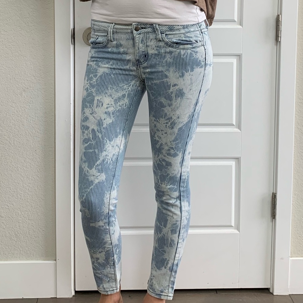 Mid-rise striped bleached super skinny jeans